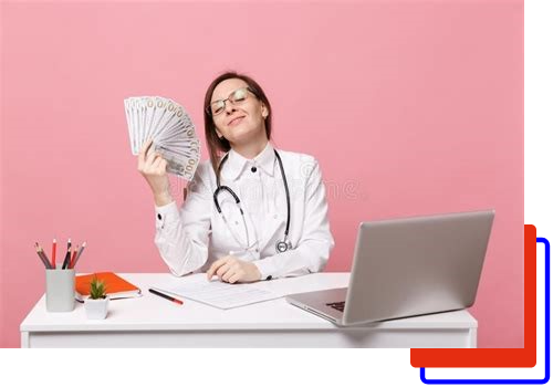 A woman sitting at her desk holding money.